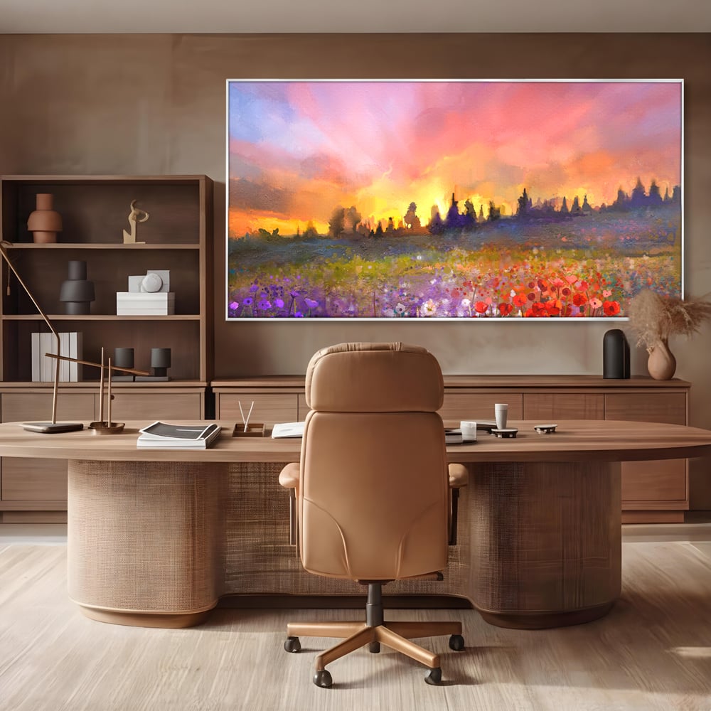 Tablou canvas cu tablou canvas cu camp cu flori si apus, in rama de aluminiu argintiu, pe perete intr-un birou